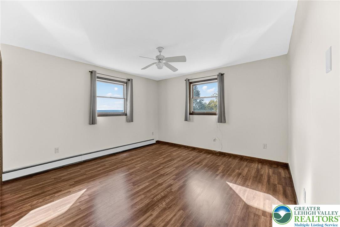 394 Flagstaff Road Lehighton, PA 18235 - Photo 26 of 75 a view of an empty room with wooden floor and a window