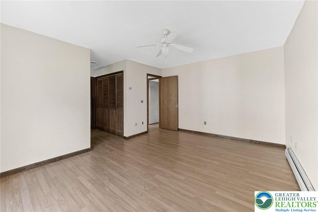 394 Flagstaff Road Lehighton, PA 18235 - Photo 29 of 75 a view of an empty room with wooden floor and a window