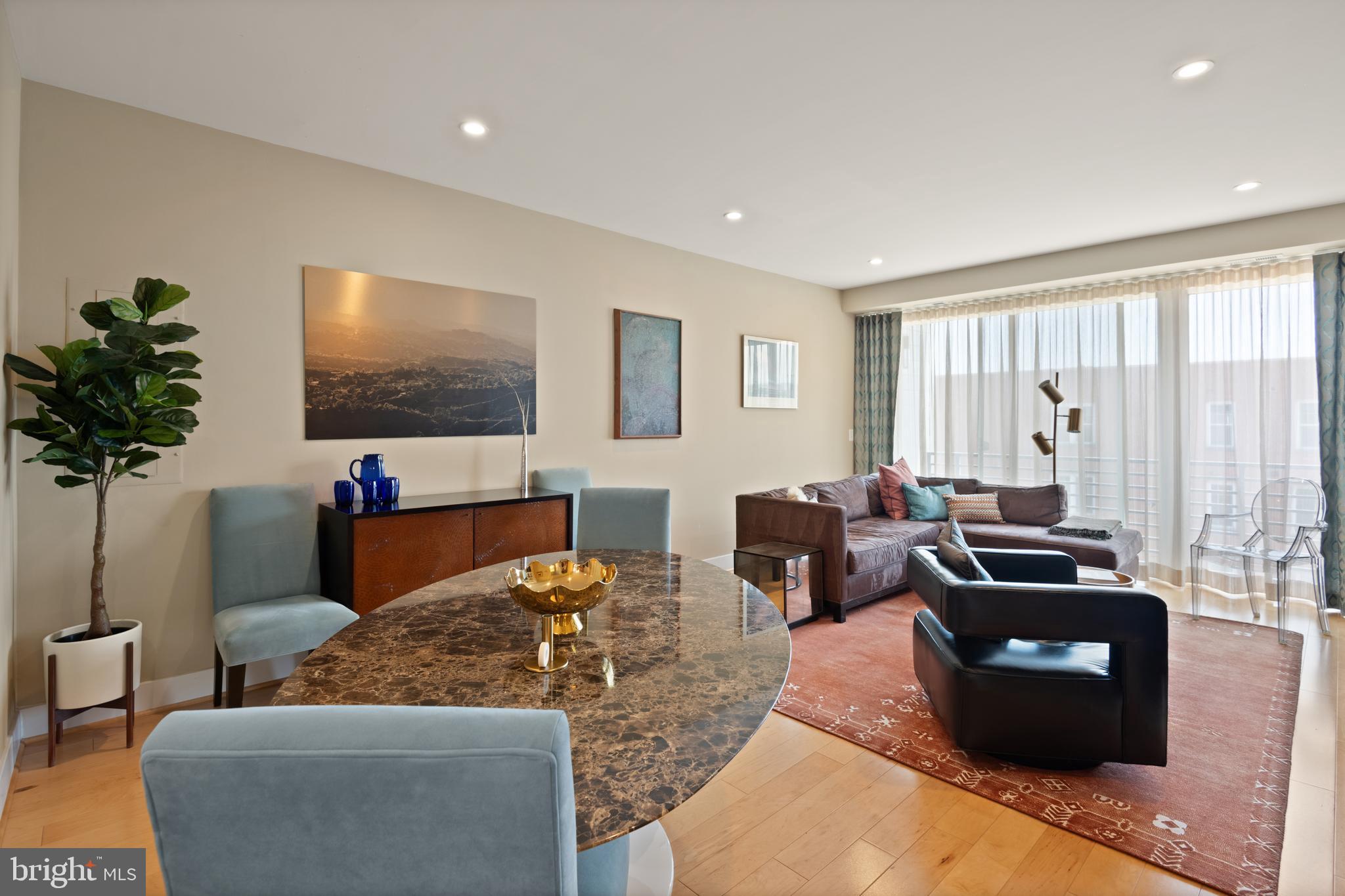 1436 Chapin Street Northwest, Unit F Washington, DC 20009 - Photo 13 of 41 a living room with furniture and a flat screen tv