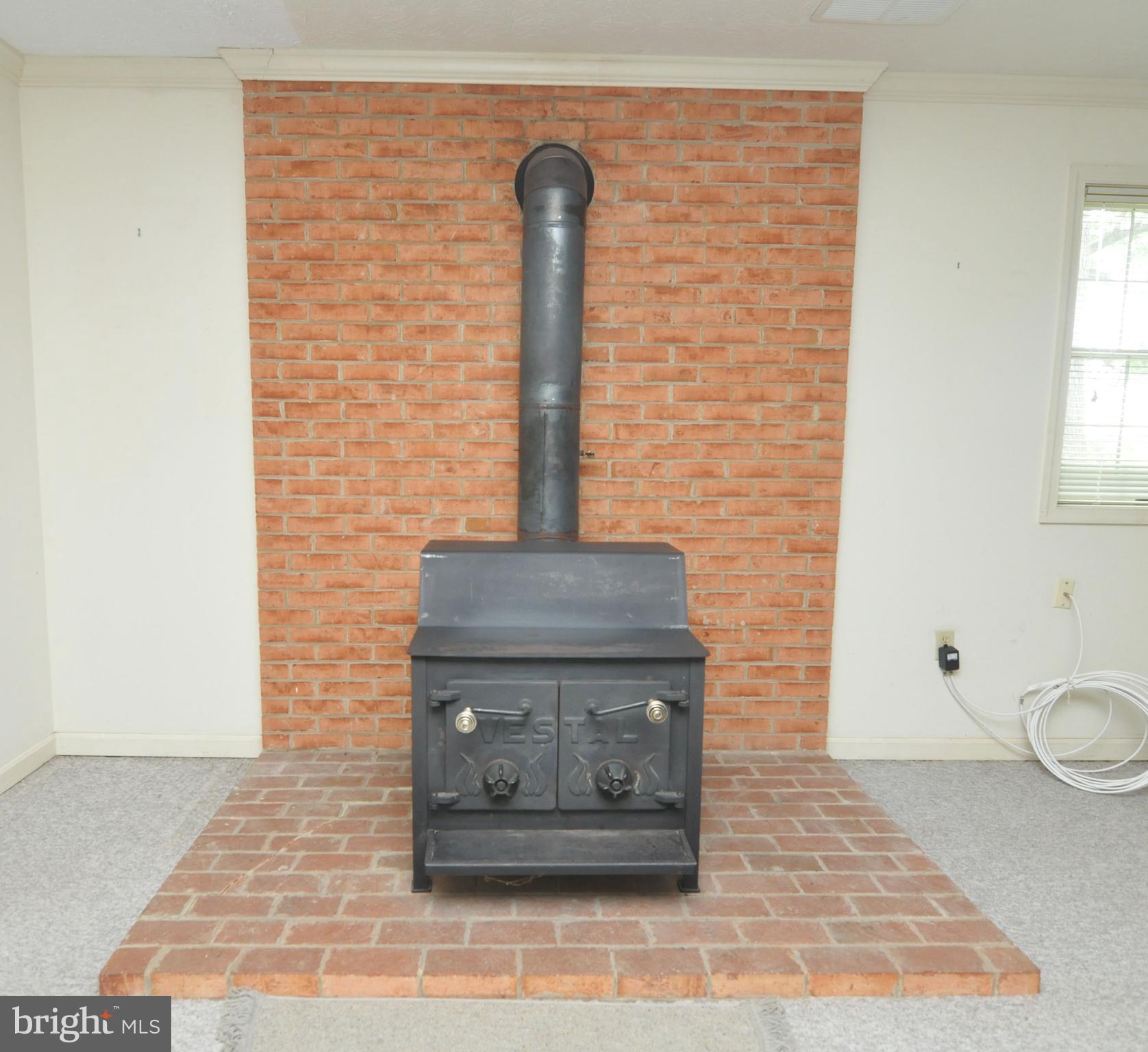 112 Forest Ridge Road Winchester, VA 22602 - Photo 47 of 53 Wood stove in family room on lower level