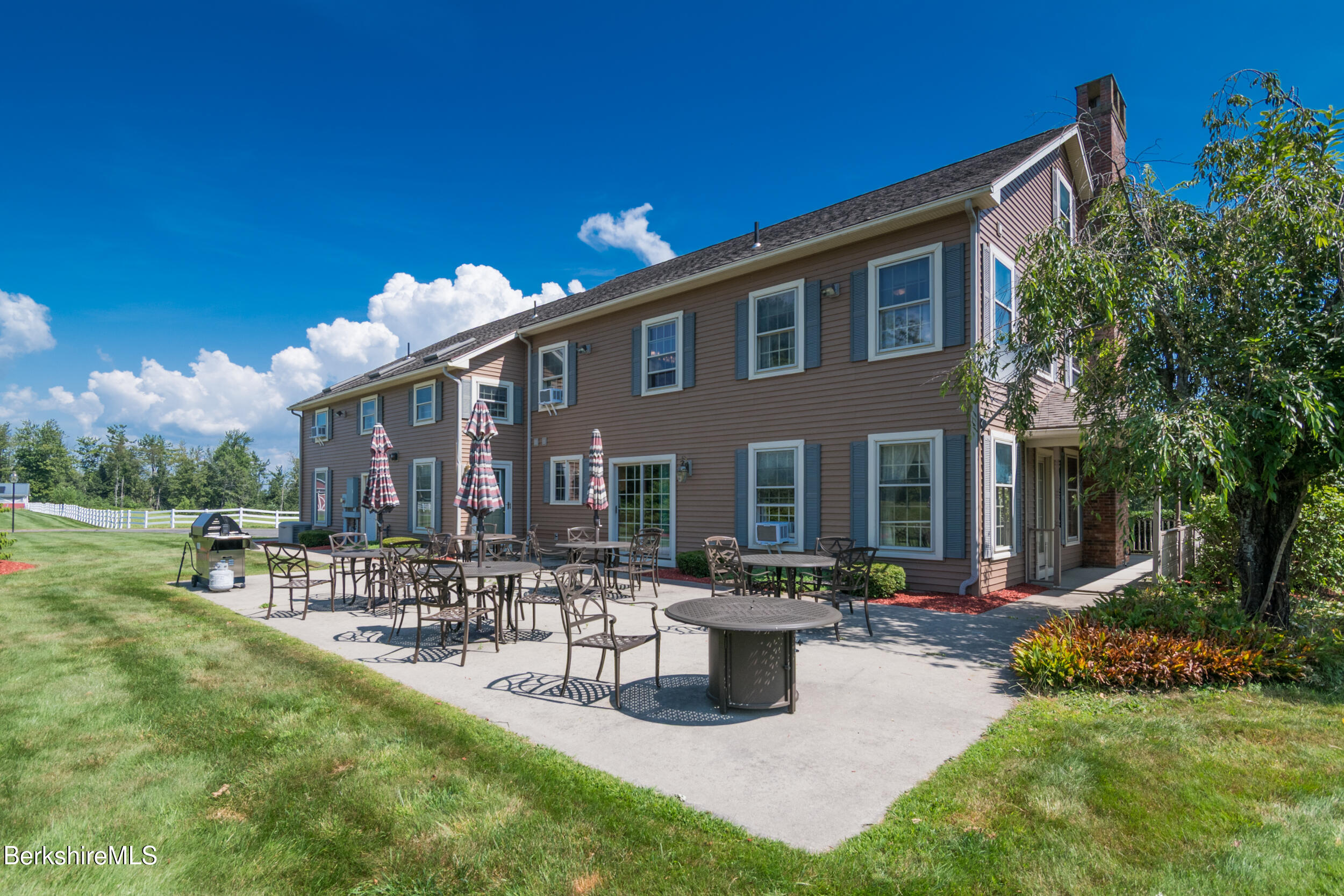31 N Road Chesterfield, MA 01012 - Photo 12 of 50 a front view of a house with patio and garden