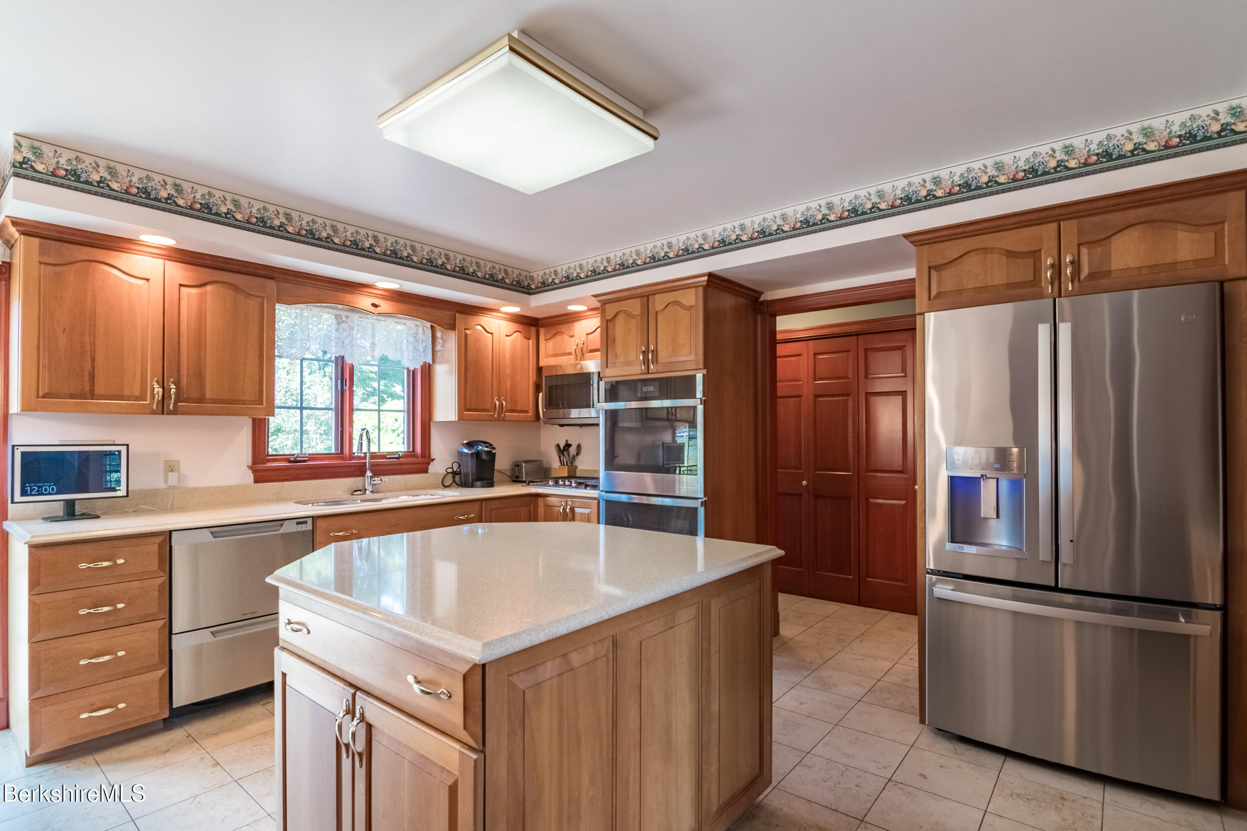 31 N Road Chesterfield, MA 01012 - Photo 22 of 50 a kitchen with granite countertop a refrigerator and a sink