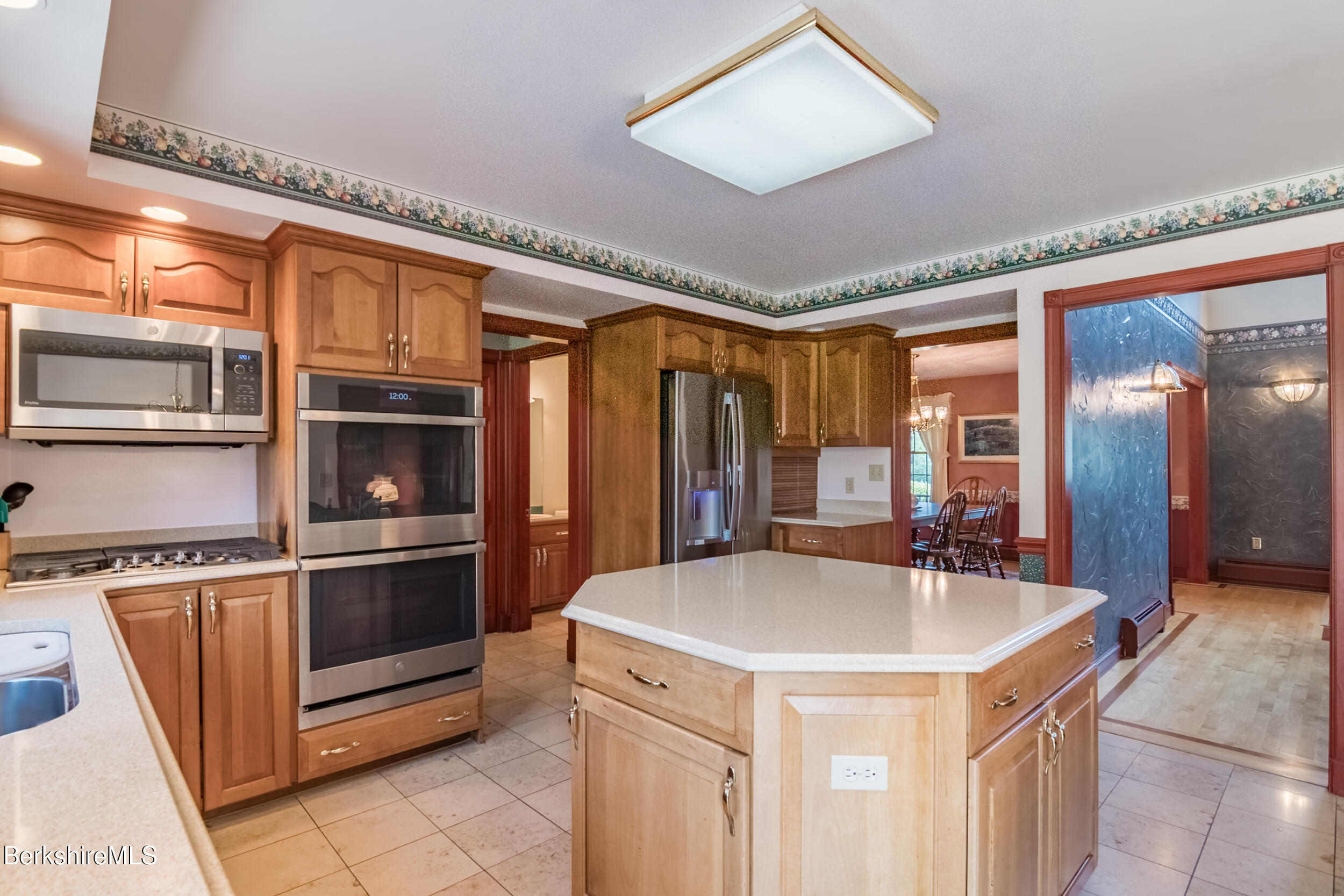 31 N Road Chesterfield, MA 01012 - Photo 23 of 50 a kitchen with stainless steel appliances a sink and a refrigerator