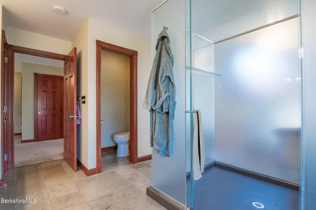 a group of people sitting in front of a store