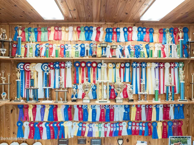 a view of a patio with table and chairs