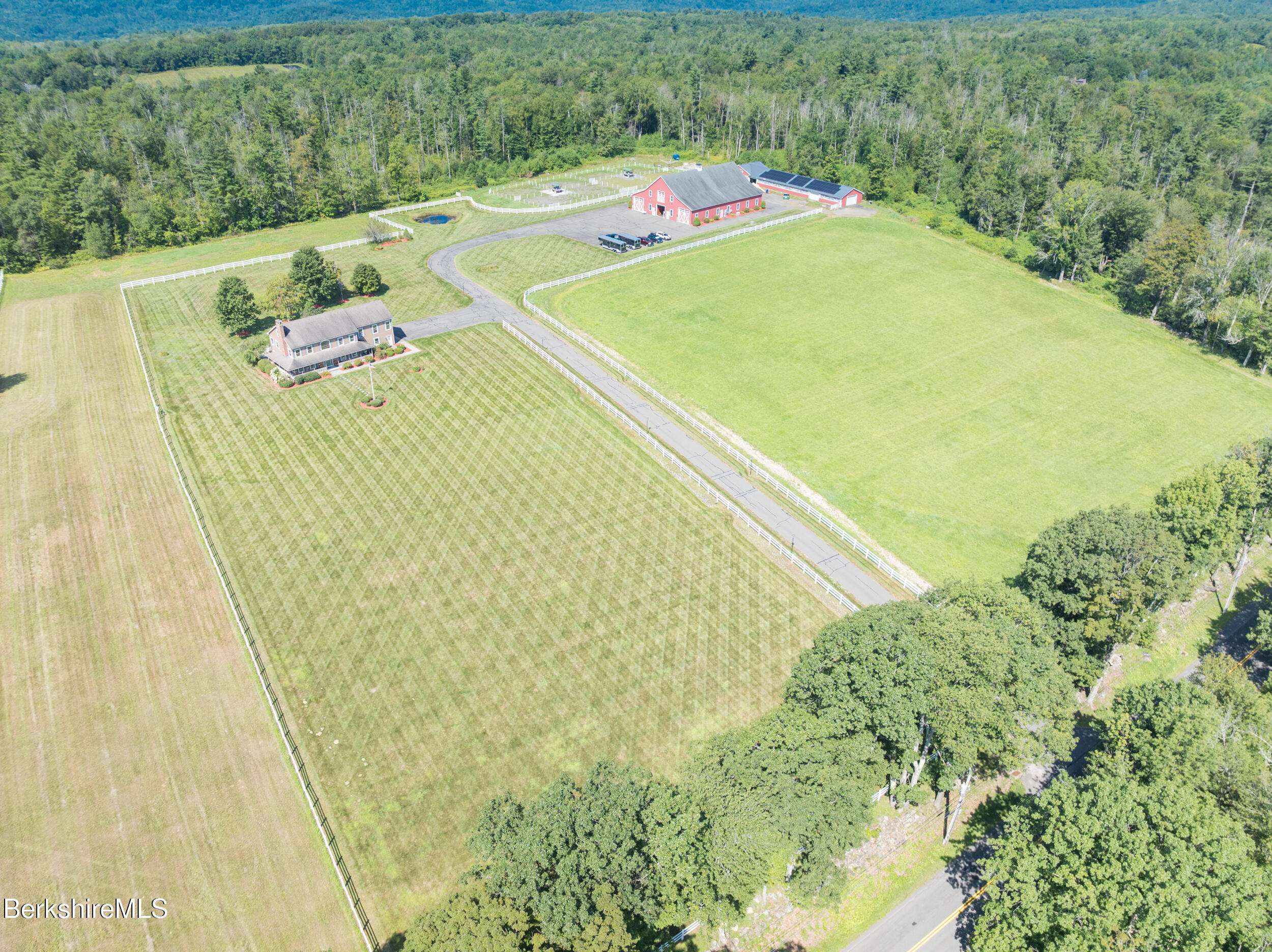 31 N Road Chesterfield, MA 01012 - Photo 7 of 50 a view of a swimming pool with a yard