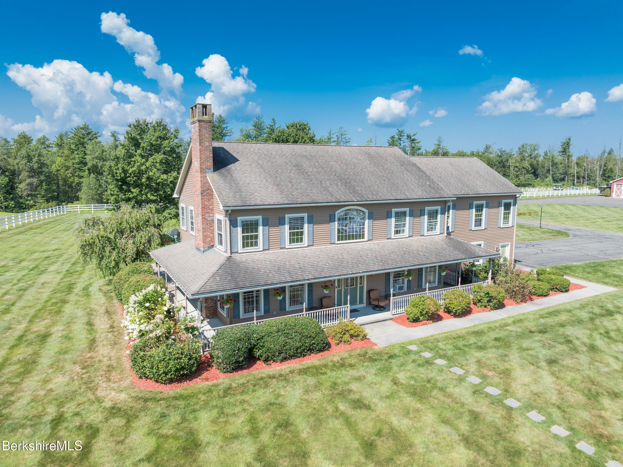 31 N Road Chesterfield, MA 01012 - Photo 9 of 50 a front view of a house with swimming pool