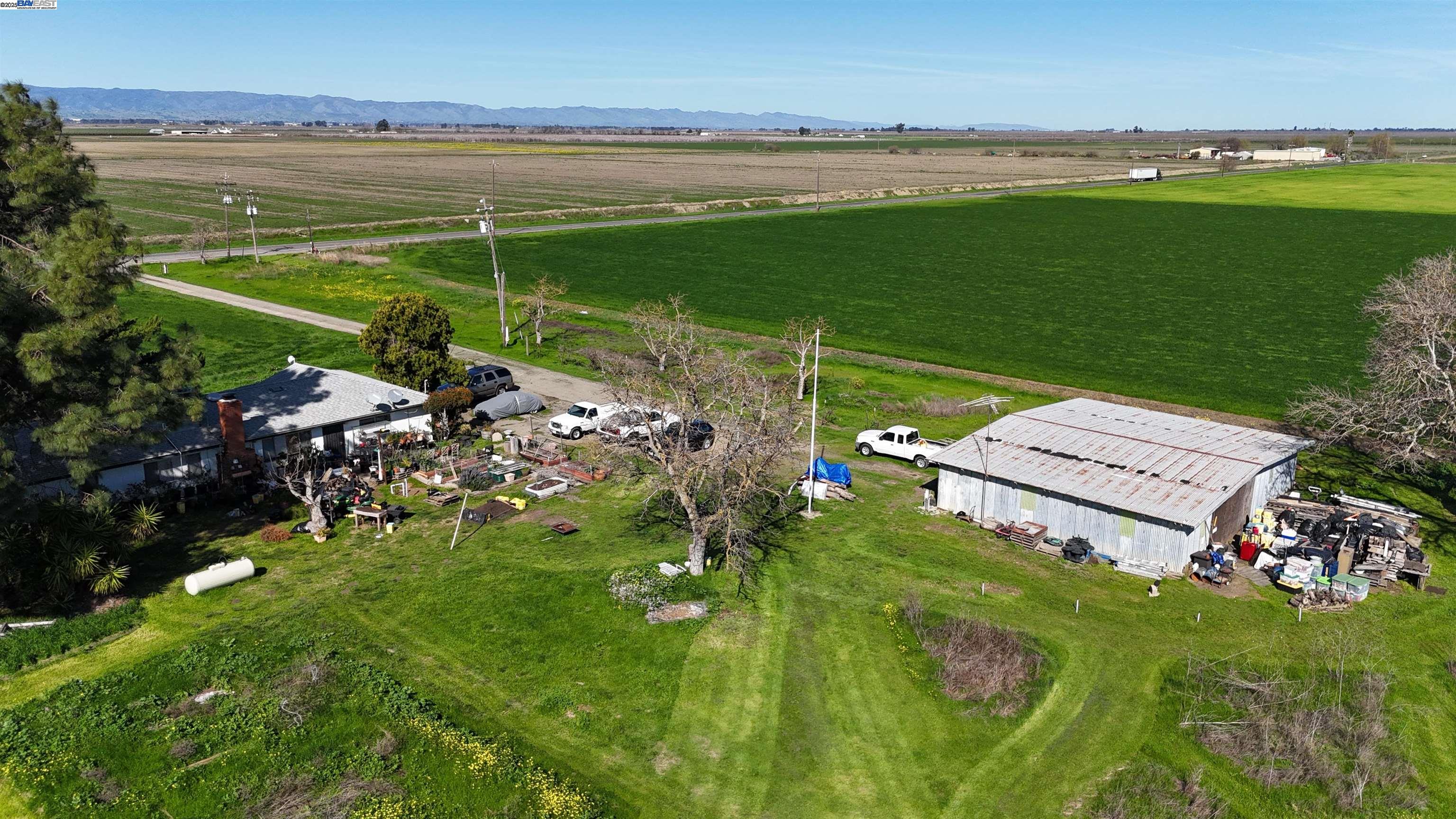 6282 Rio Dixon Road Dixon, CA 95620 - Photo 2 of 8 a view of a water pond with green field