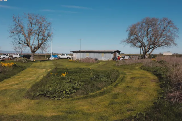 a view of a swimming pool with an outdoor space and seating area