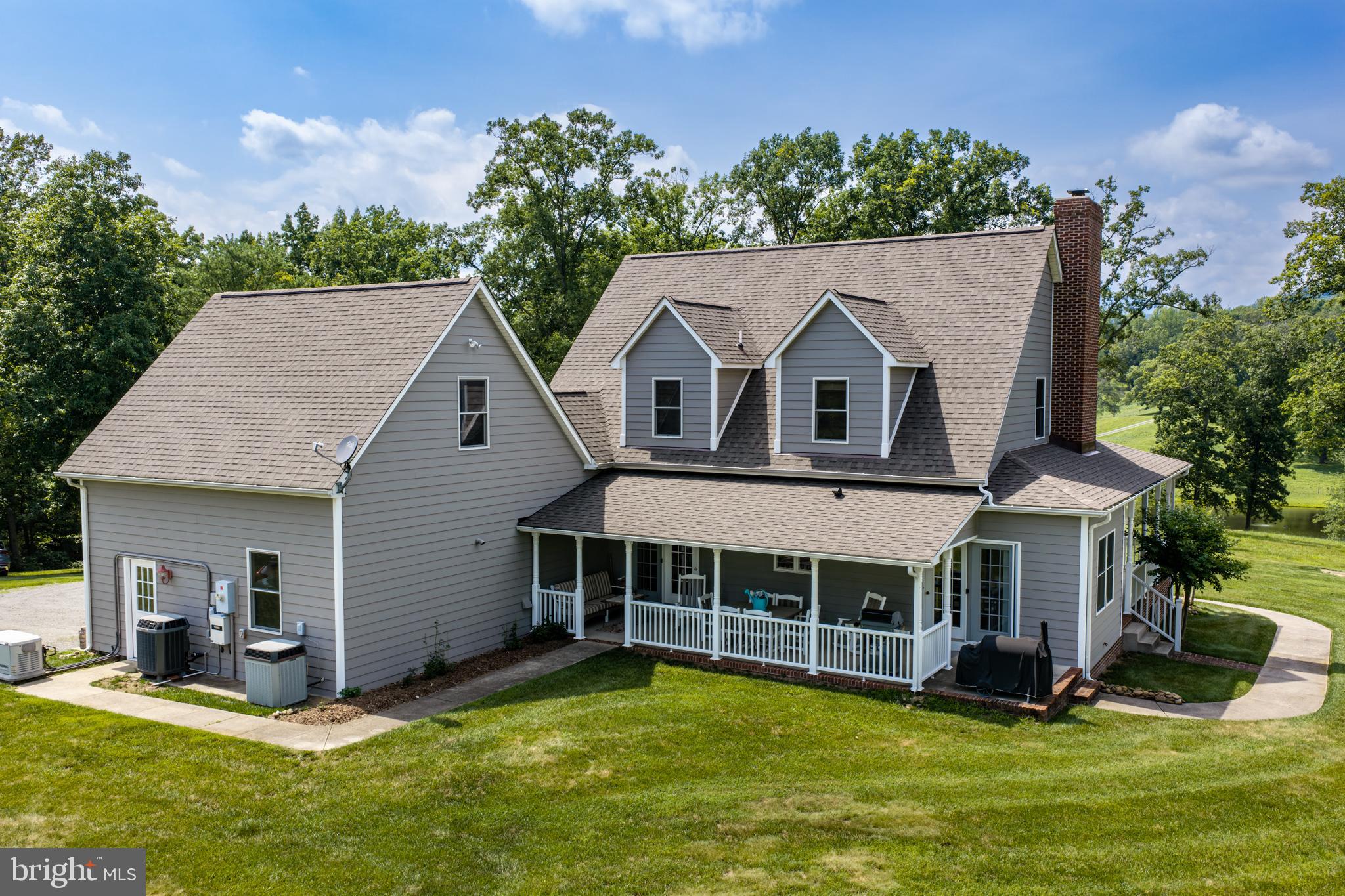 1688 Desert Road Reva, VA 22735 - Photo 46 of 81 a view of a house with a yard and sitting area