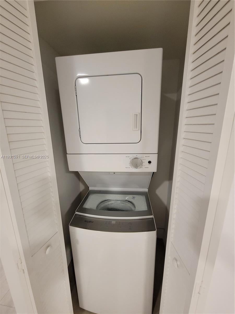 6001 West Flagler Street, Unit 302 Miami, FL 33144 - Photo 11 of 12 a utility room with dryer and washer