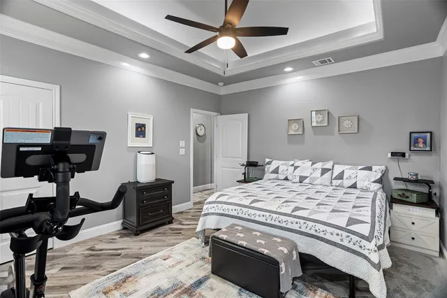 a bedroom with a bed and a view of bathroom