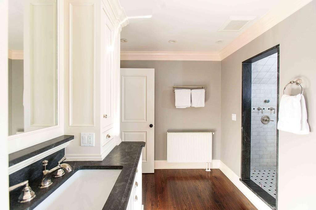 118 Abbott Road Wellesley, MA 02481 - Photo 14 of 20 a view of a hallway with bathroom and wooden floor