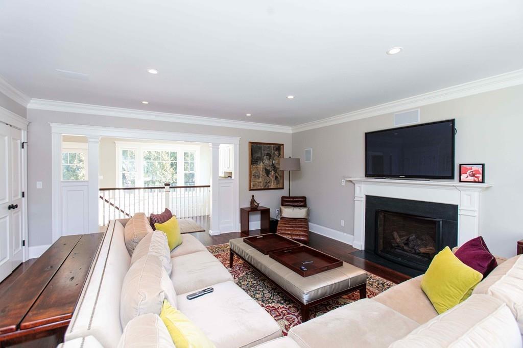 118 Abbott Road Wellesley, MA 02481 - Photo 2 of 20 a living room with furniture and a fireplace