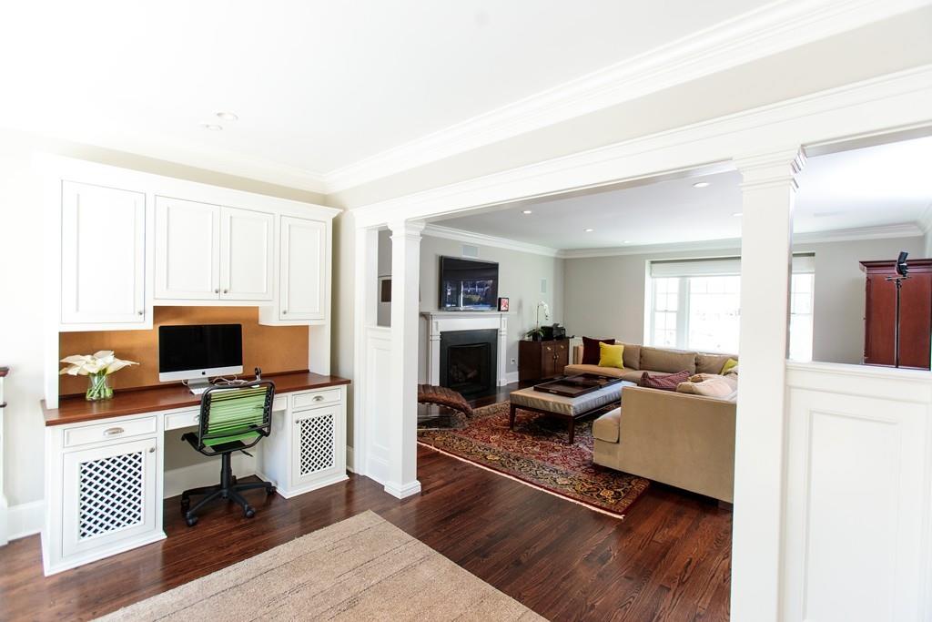 118 Abbott Road Wellesley, MA 02481 - Photo 3 of 20 a living room with furniture and a fireplace