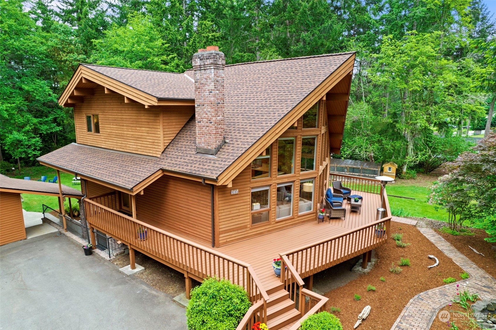 835 Hyak Way Fox Island, WA 98333 - Photo 30 of 38 a aerial view of a house with a yard