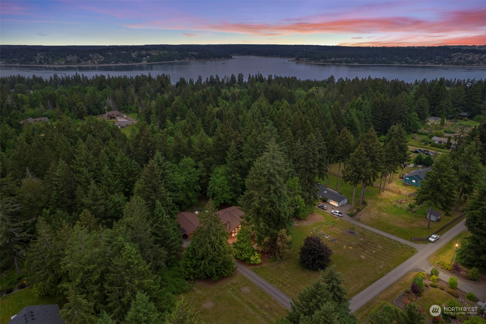 835 Hyak Way Fox Island, WA 98333 - Photo 38 of 38 an aerial view of a house with a yard