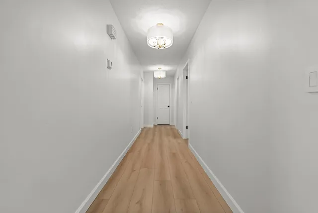 a view of a hallway with entryway