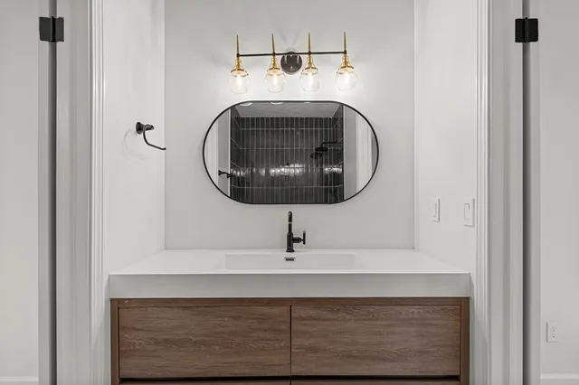 a sink sitting in a bathroom