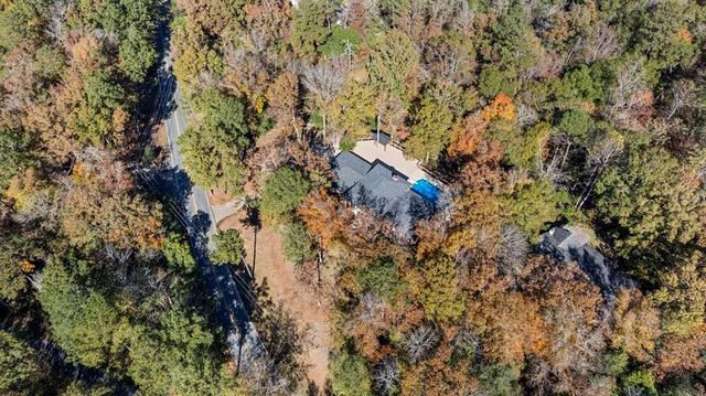 a view of a house with a tree