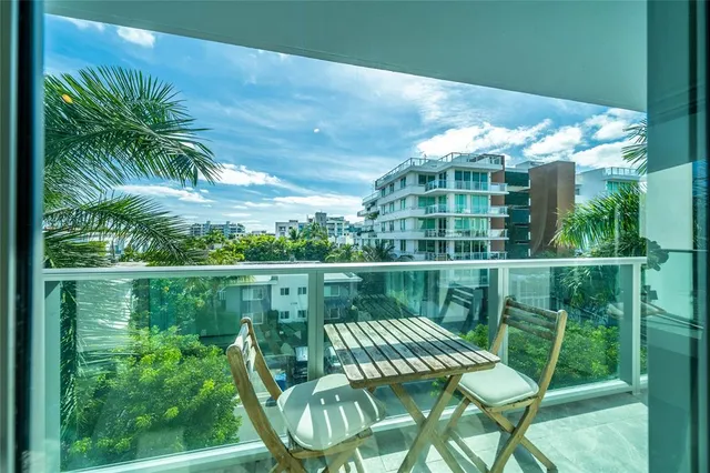 a kitchen with a stove and a refrigerator