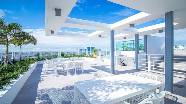 a view of swimming pool from a balcony