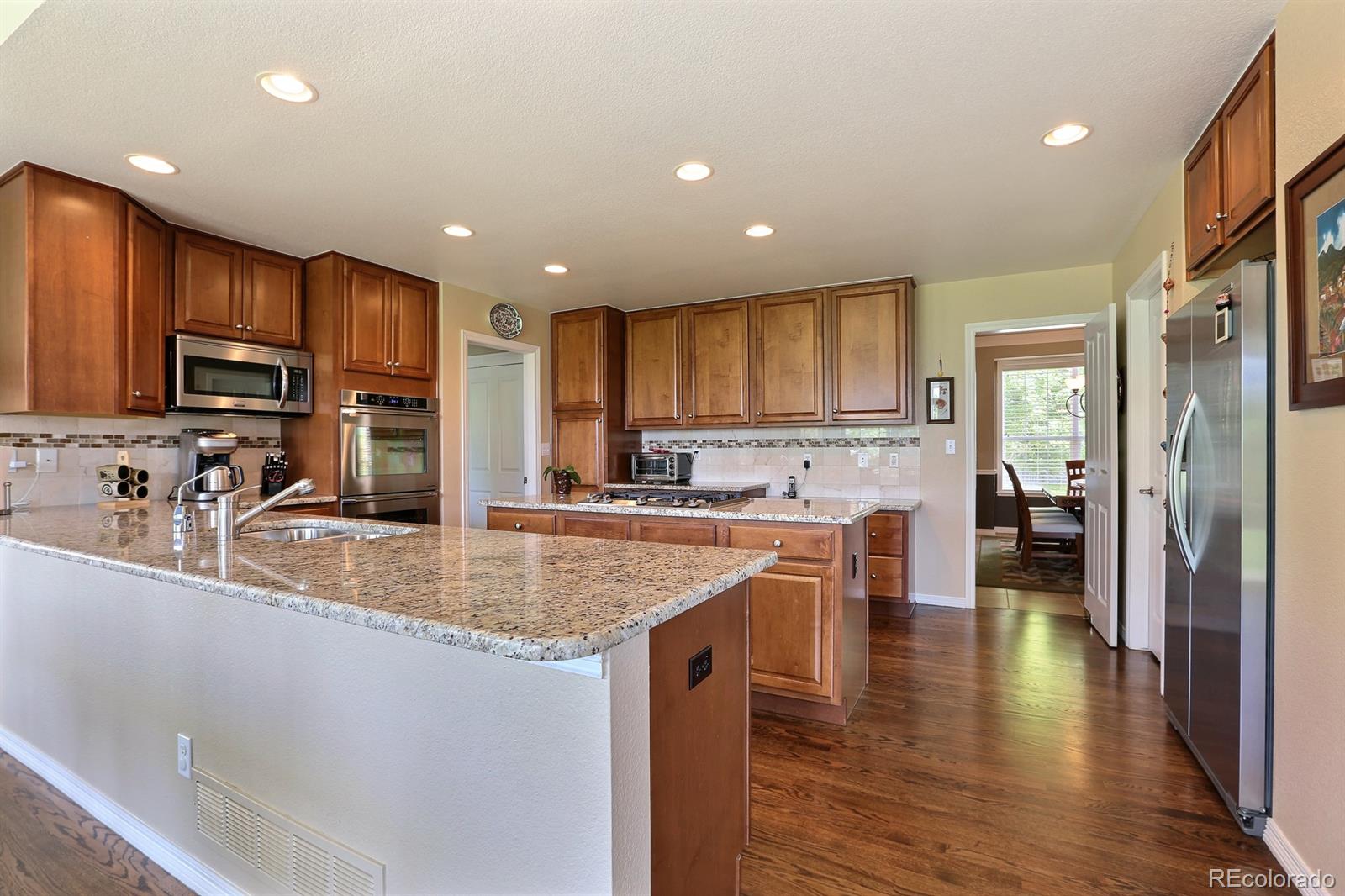 10614 Ridgecrest Circle Highlands Ranch, CO 80129 - Photo 12 of 35 Gallery Image 12