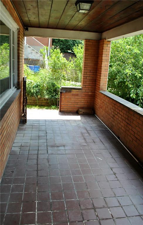 228 Bascom Avenue Pittsburgh, PA 15214 - Photo 11 of 24 Large tiled porch with plenty of room for outdoor furniture to watch the days and nights go by!