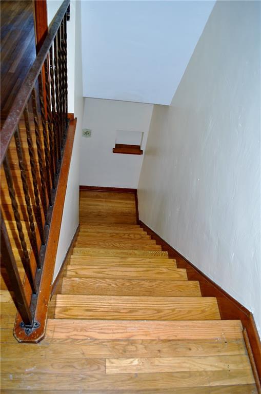 228 Bascom Avenue Pittsburgh, PA 15214 - Photo 19 of 24 Hard wood stair case and wrought iron railing are just a few of the details this home has throughout!
