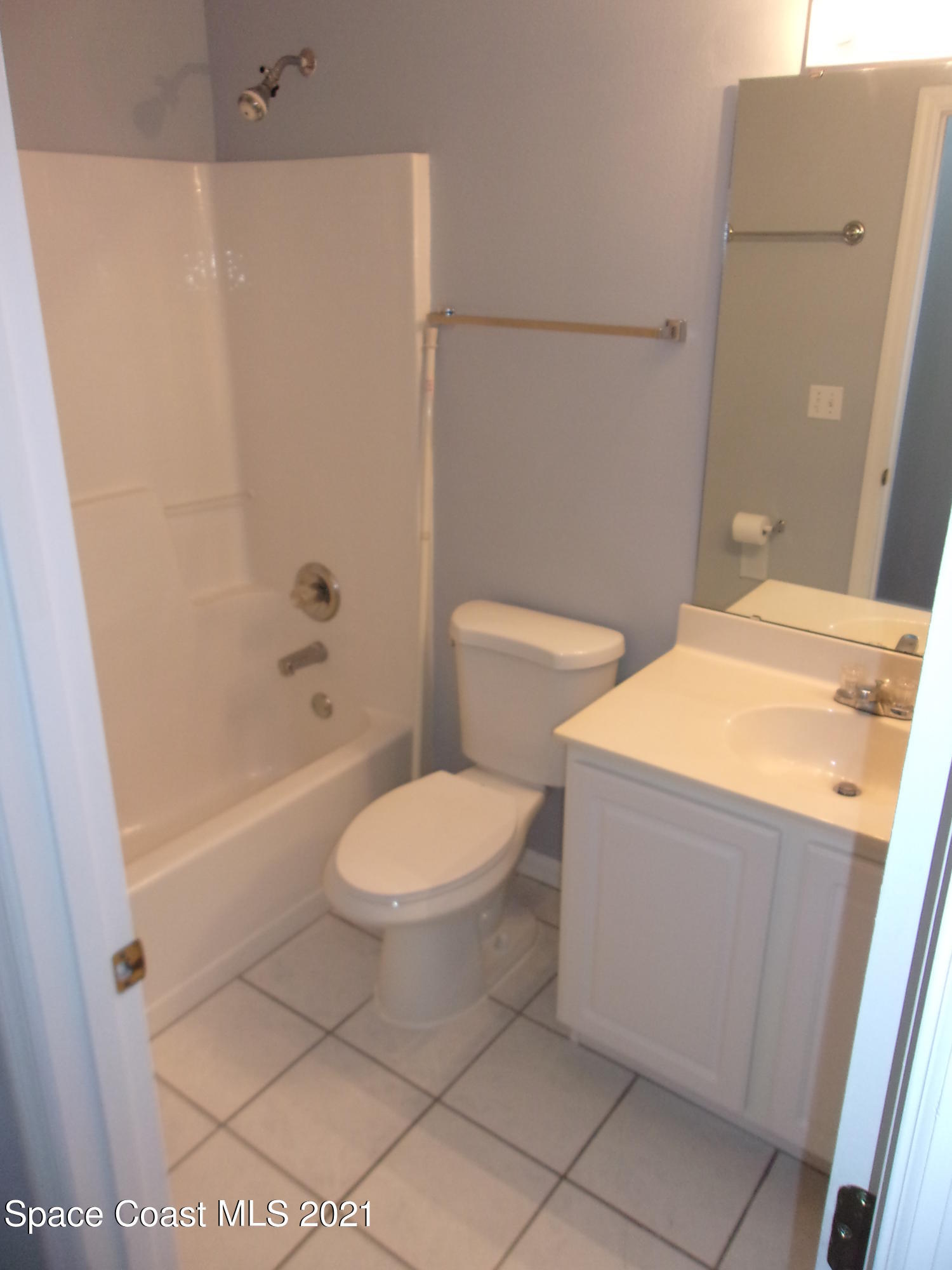 3908 Upmann Drive Rockledge, FL 32955 - Photo 18 of 35 a white toilet sitting next to a bath tub