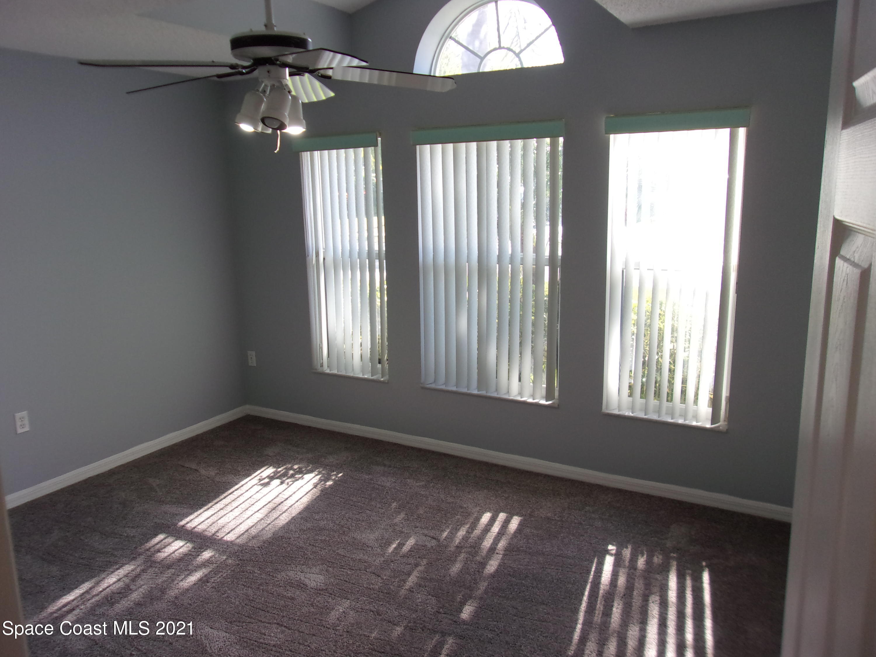 3908 Upmann Drive Rockledge, FL 32955 - Photo 19 of 35 a view of an empty room with a window