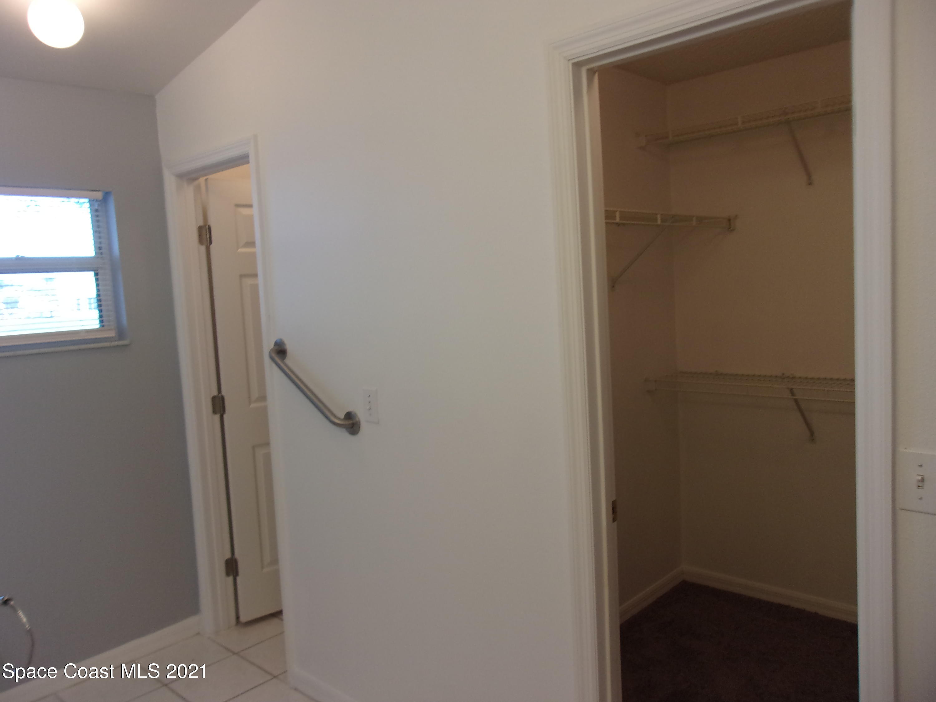 3908 Upmann Drive Rockledge, FL 32955 - Photo 32 of 35 a bathroom with a shower