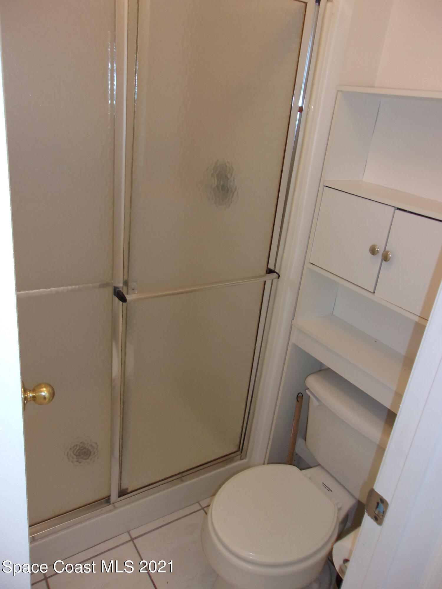 3908 Upmann Drive Rockledge, FL 32955 - Photo 34 of 35 a white toilet sitting next to a shower