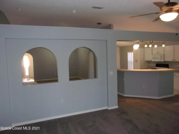 a view of an empty room and window