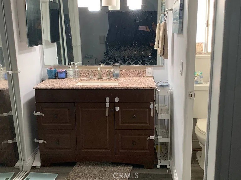 5700 Carbon Canyon Road, Unit 62 Brea, CA 92823 - Photo 4 of 4 a bathroom with a sink and a mirror