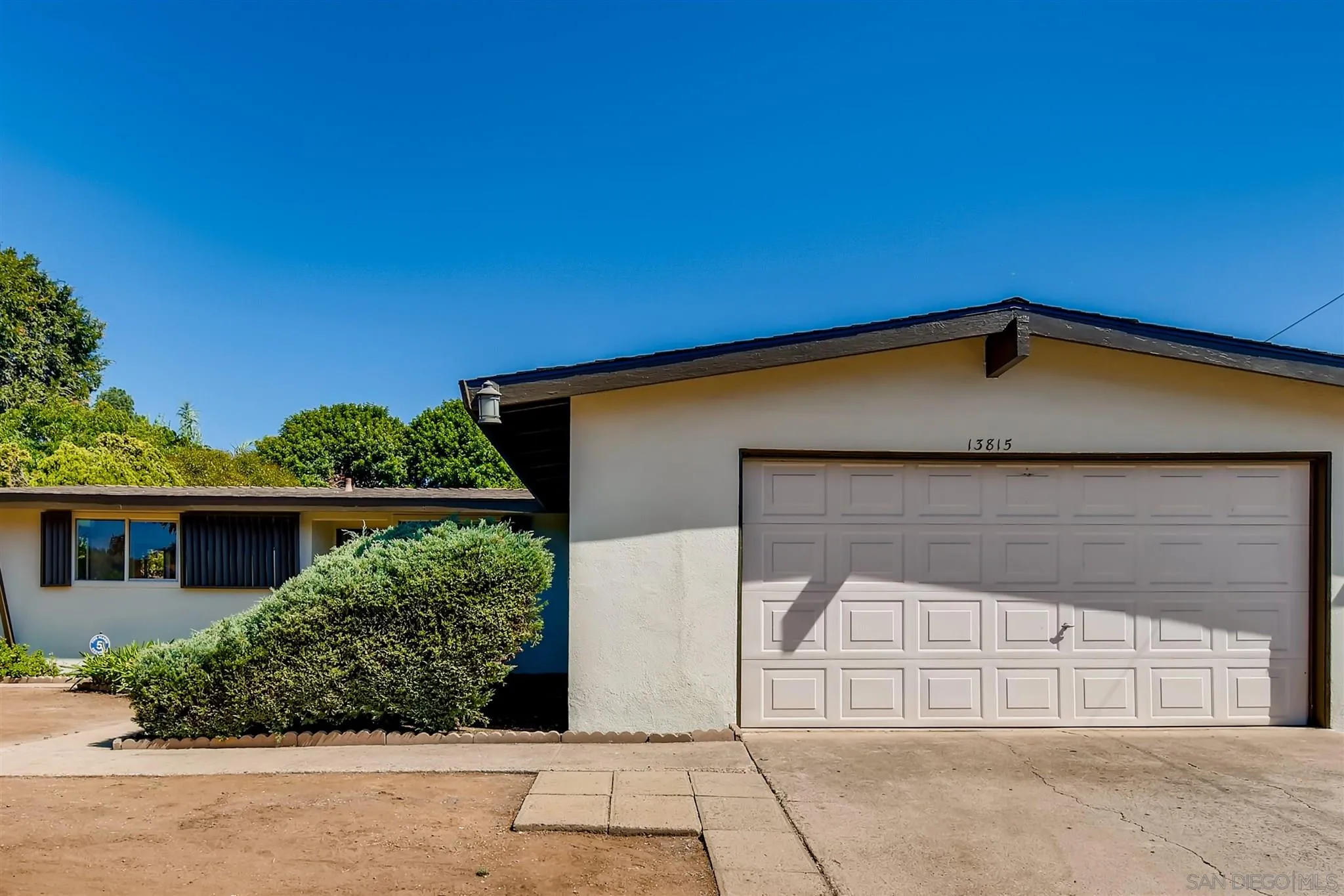 13815 Frame Road Poway, CA 92064 - Photo 2 of 12 a front view of a house with a yard