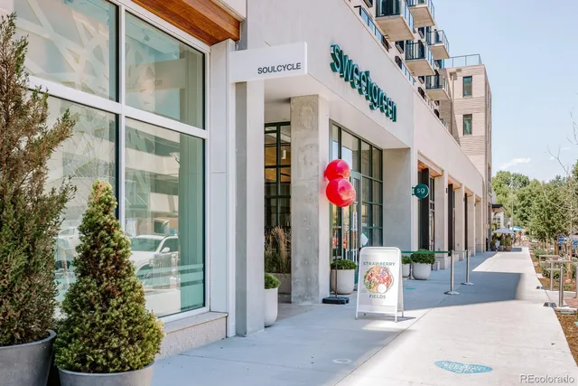 a view of a building with sitting area