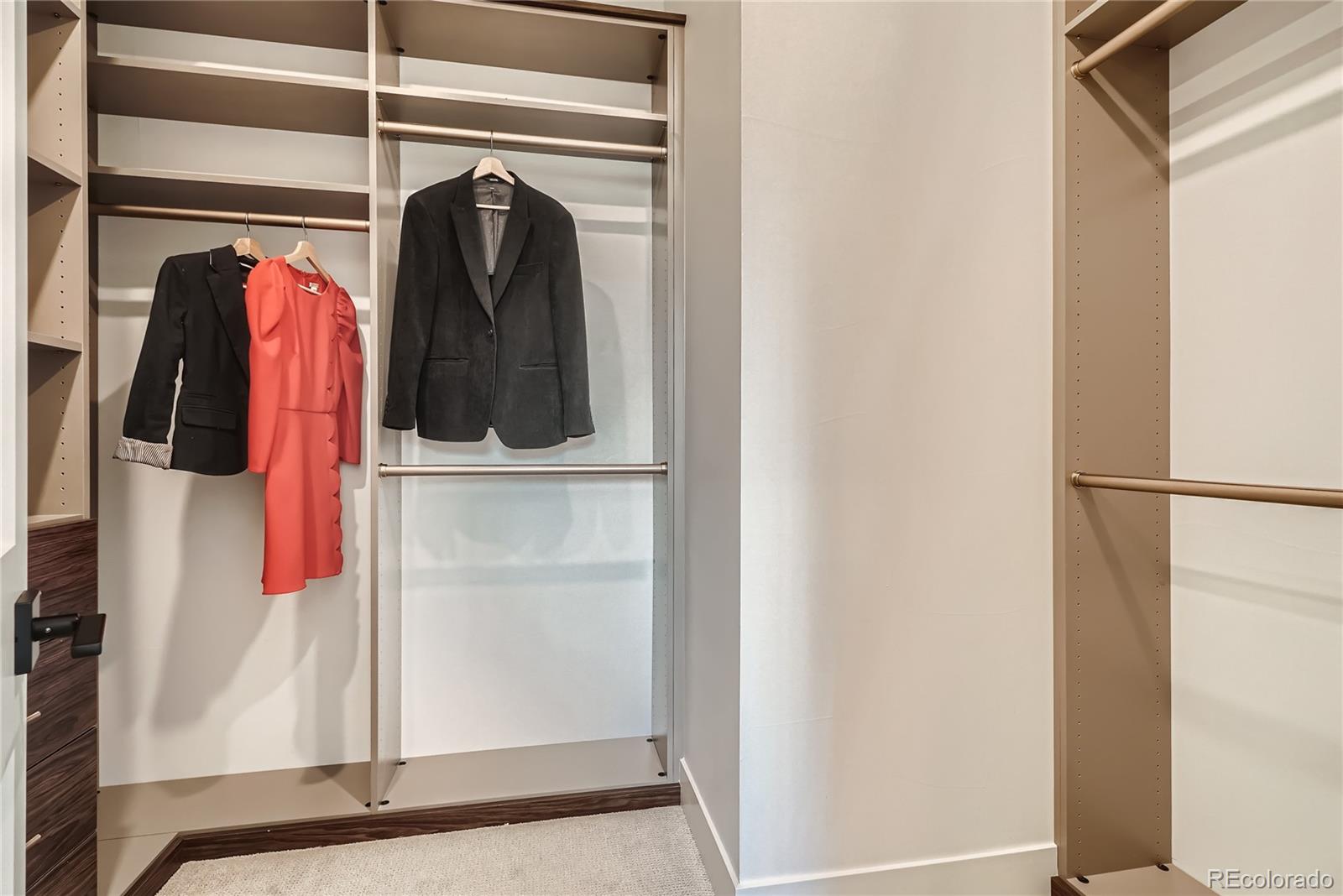 308 East Orchard Road Centennial, CO 80121 - Photo 20 of 26 a view of walk in closet with clothes and shoes