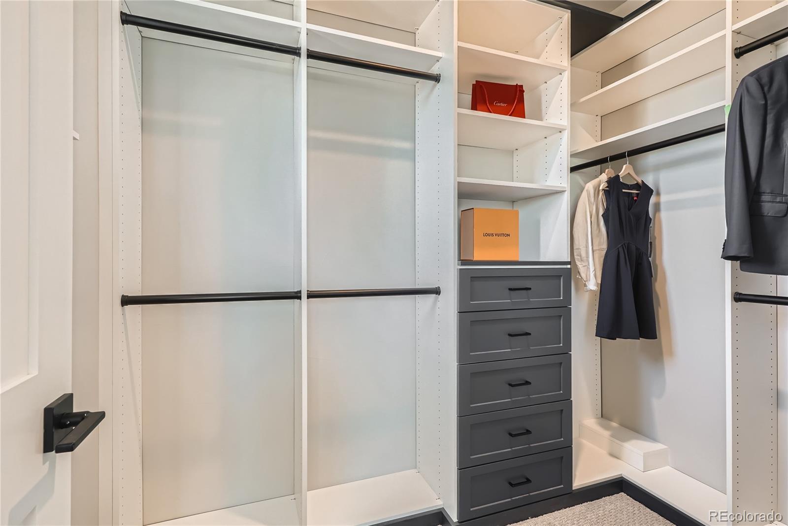 308 East Orchard Road Centennial, CO 80121 - Photo 21 of 26 a view of walk in closet with clothes