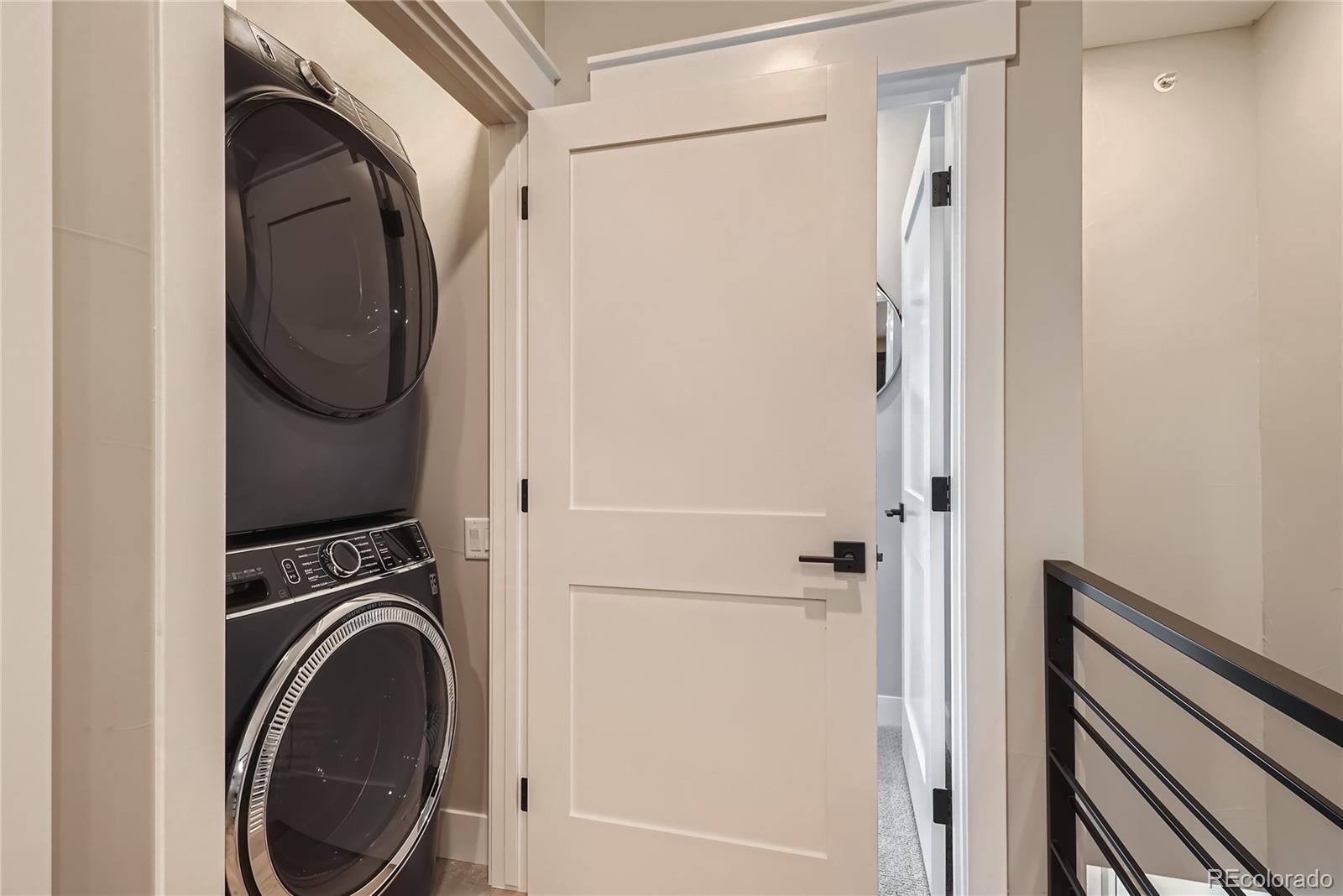 308 East Orchard Road Centennial, CO 80121 - Photo 25 of 26 a utility room with dryer and washer