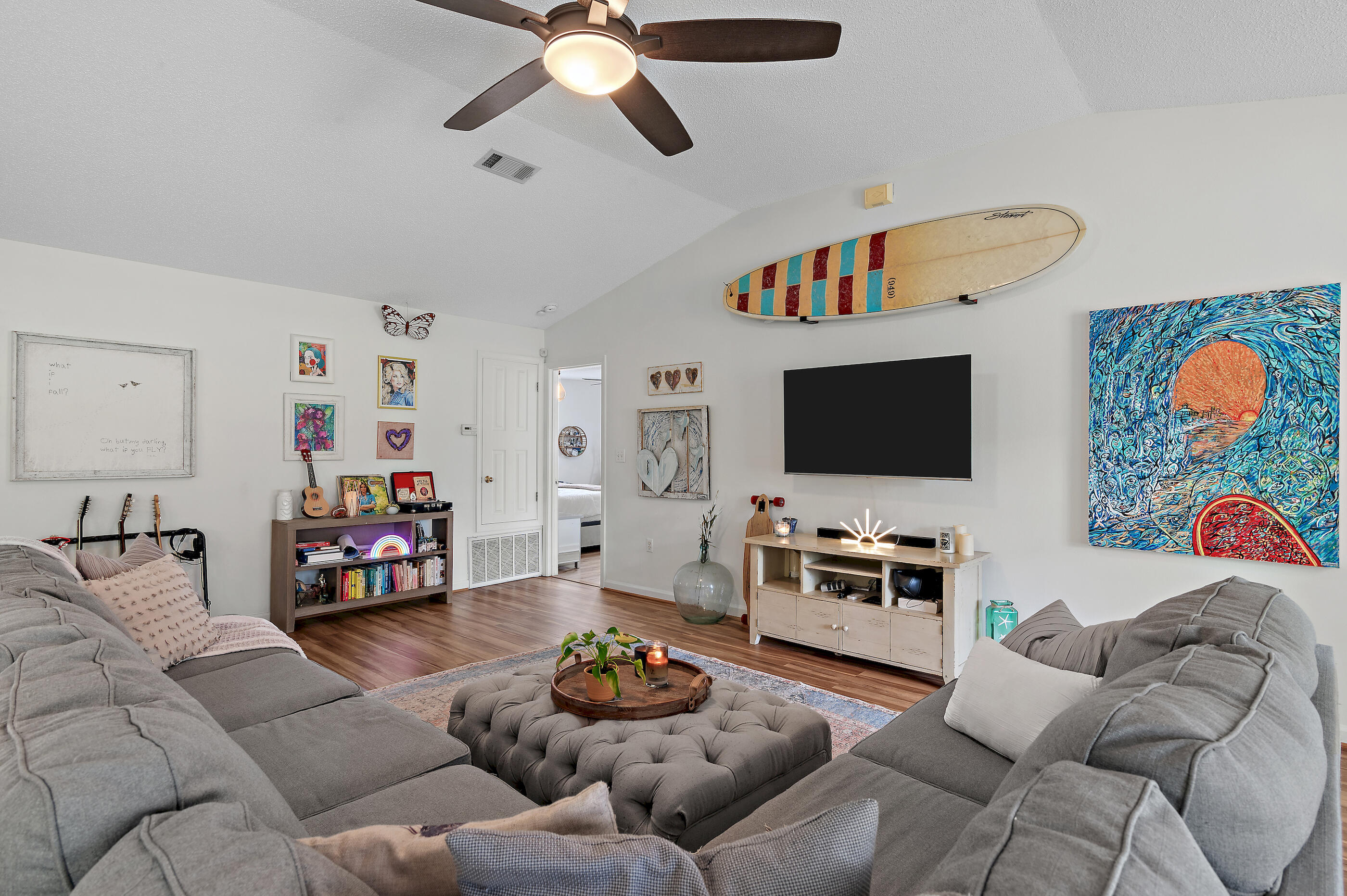 675 Spring Hill Road DeFuniak Springs, FL 32433 - Photo 3 of 46 a living room with furniture and a flat screen tv