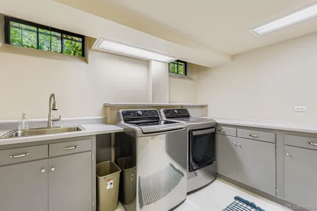 a kitchen with a stove and a sink