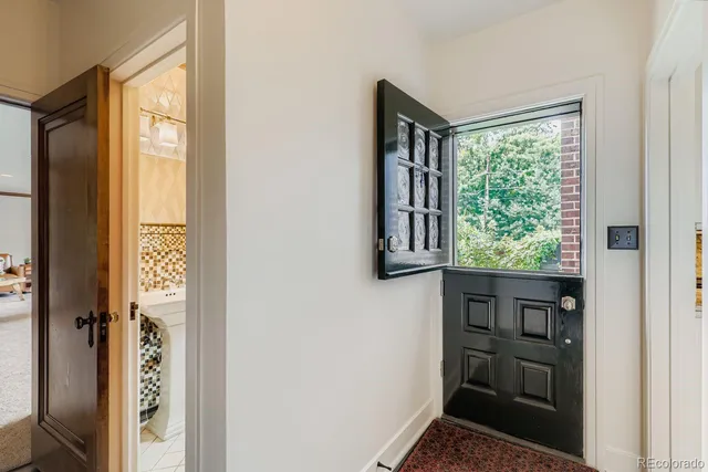 a view of an entryway with a window