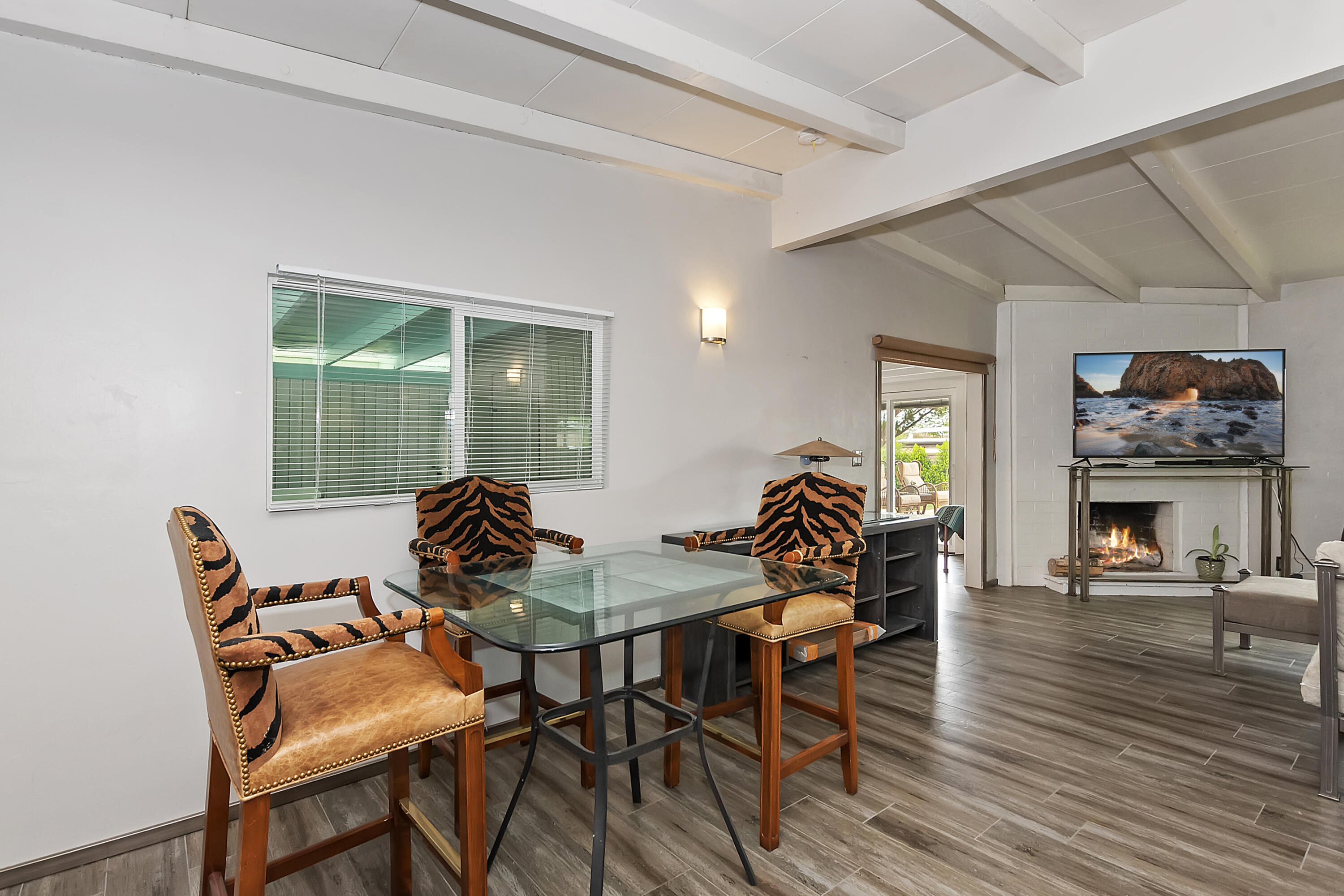 38957 Miller Lane Cathedral City, CA 92234 - Photo 12 of 34 a table and chairs in a room
