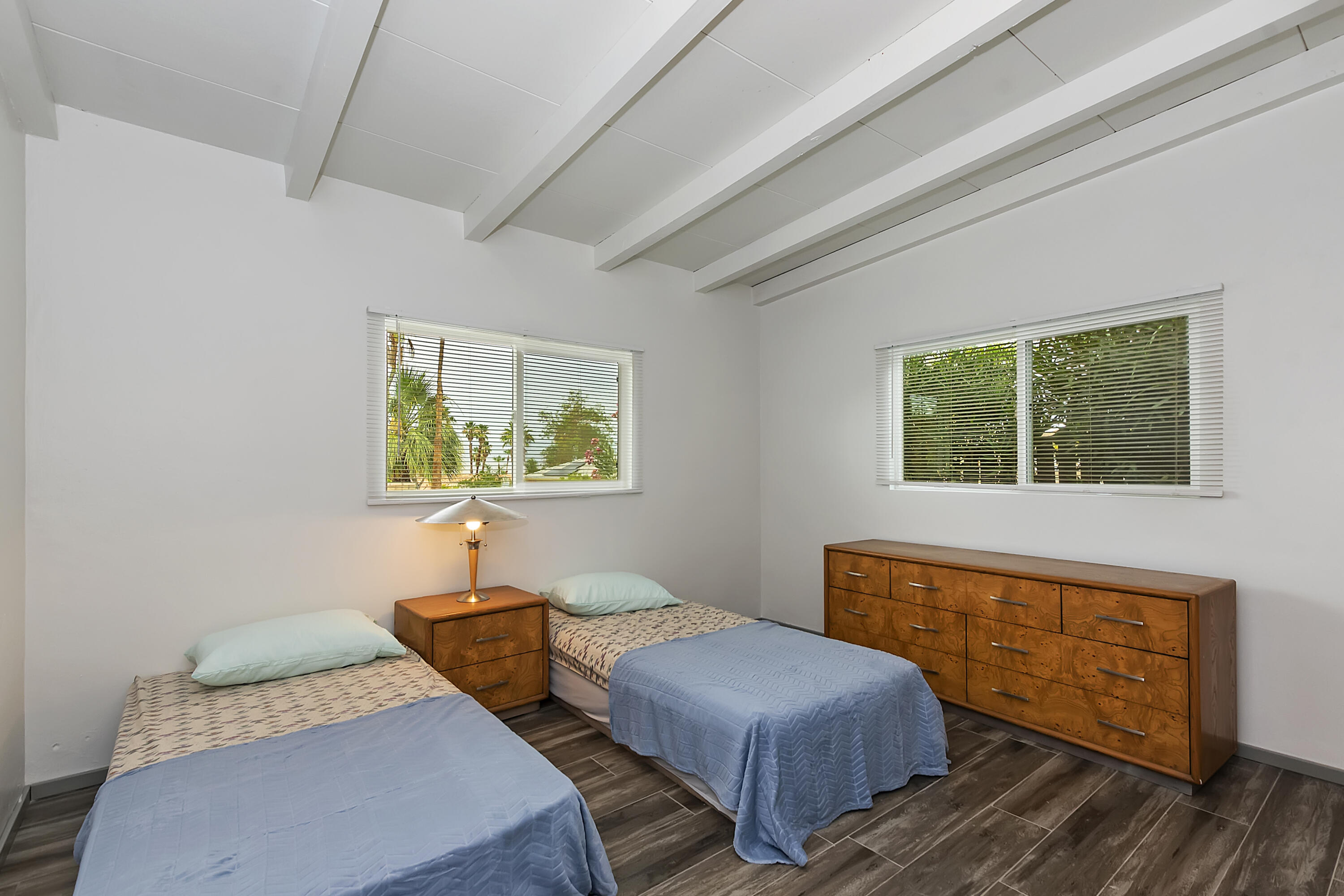 38957 Miller Lane Cathedral City, CA 92234 - Photo 17 of 34 a bedroom with two beds and a window