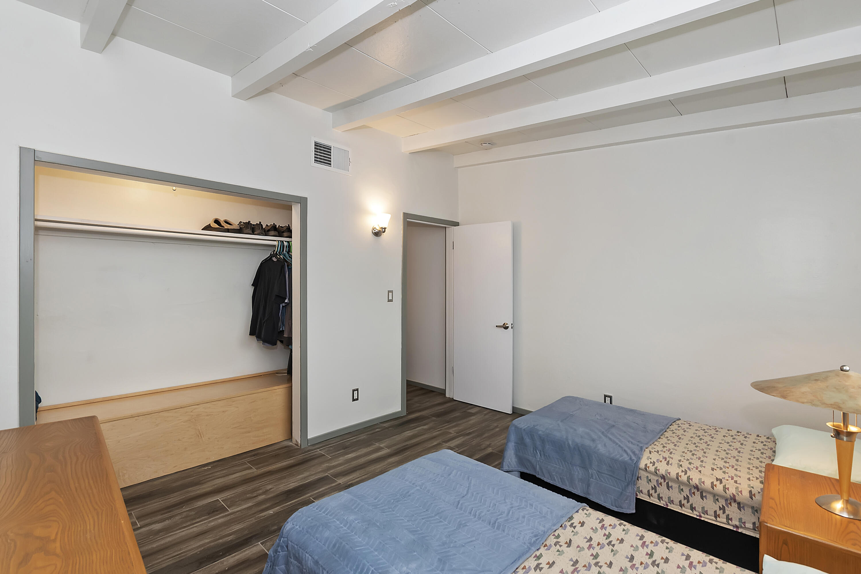 38957 Miller Lane Cathedral City, CA 92234 - Photo 18 of 34 a bedroom with a bed and a window