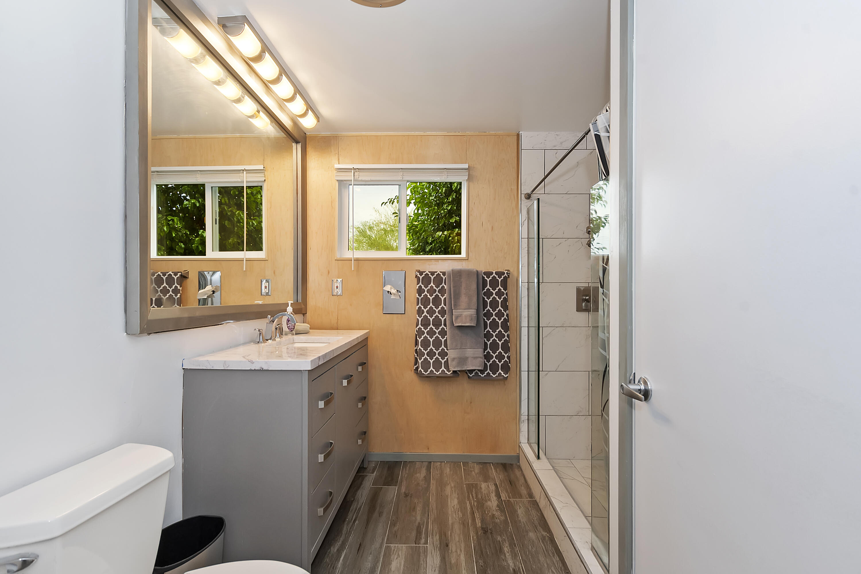 38957 Miller Lane Cathedral City, CA 92234 - Photo 20 of 34 a bathroom with a toilet sink and mirror
