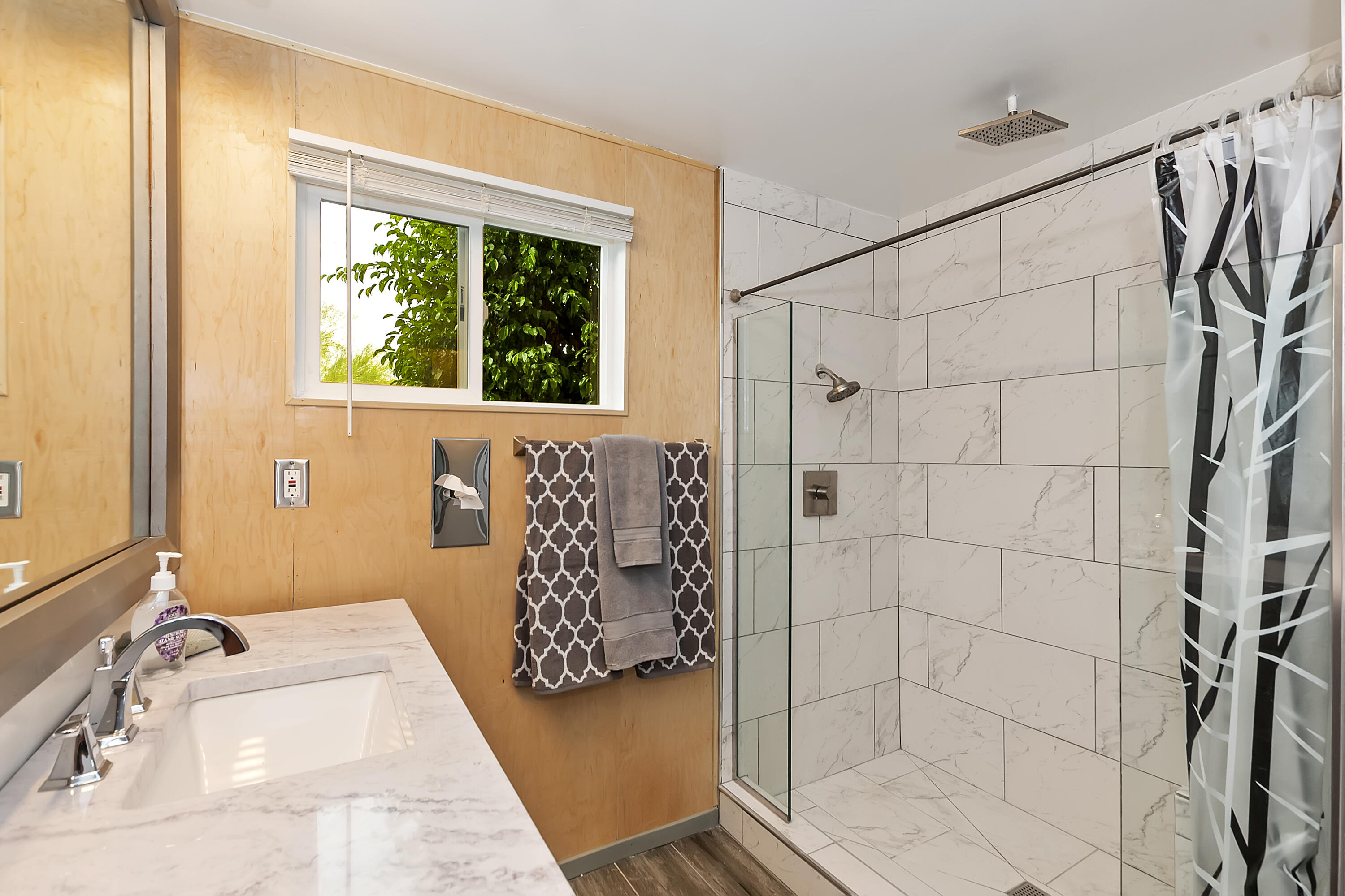 38957 Miller Lane Cathedral City, CA 92234 - Photo 22 of 34 a bathroom with a shower and a sink