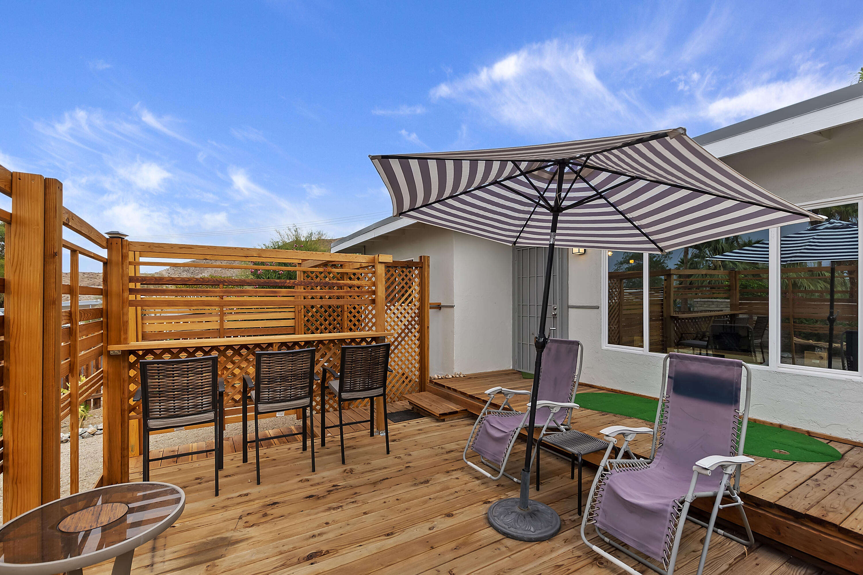 38957 Miller Lane Cathedral City, CA 92234 - Photo 25 of 34 a patio with table and chairs