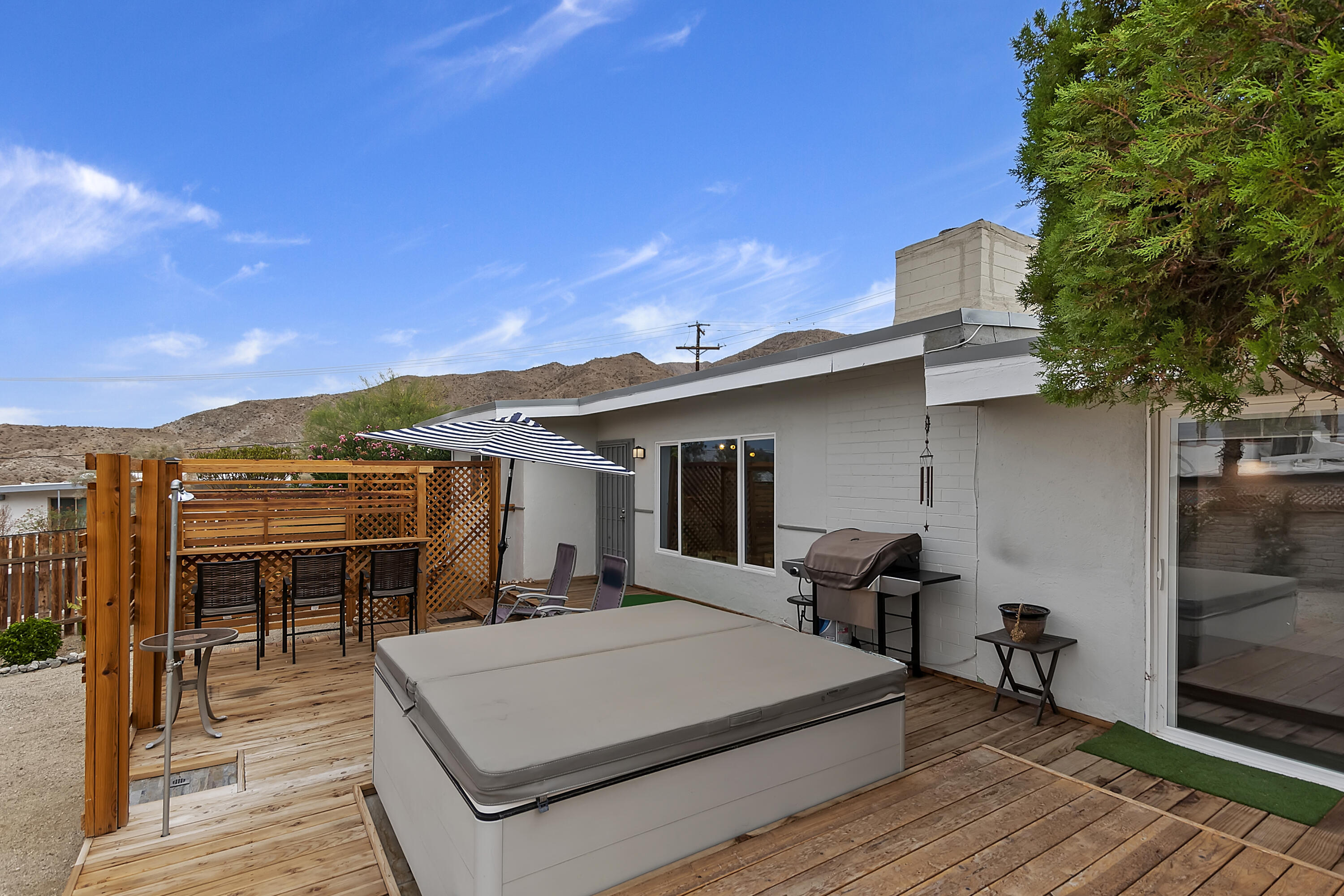 38957 Miller Lane Cathedral City, CA 92234 - Photo 26 of 34 a view of a terrace with chairs